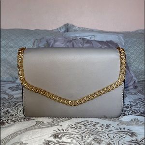 Brand Unknown, Crossbody purse, Grayish color with gold chain